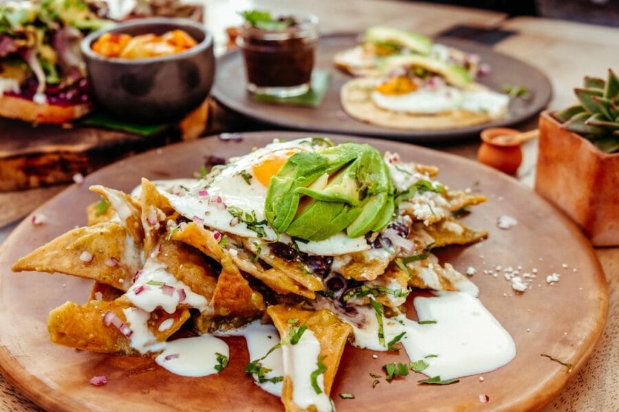traditional mexican breakfast dish with tortilla and cheese