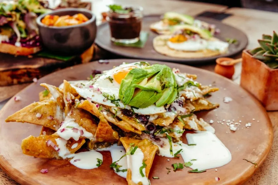 traditional mexican breakfast dish with tortilla and cheese