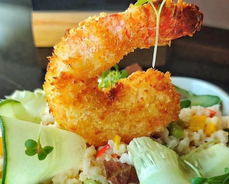 salad with fried shrimp in cafe