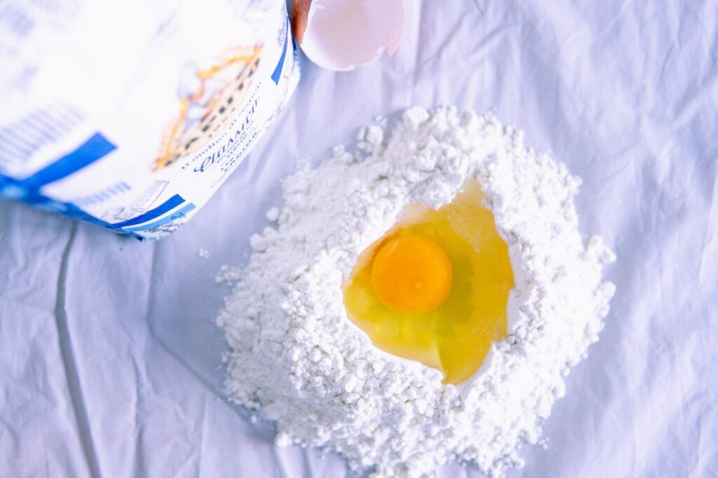 yellow egg on white powder