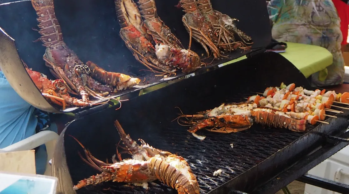 Lobesters Grilling in Belize - Belize Seafood