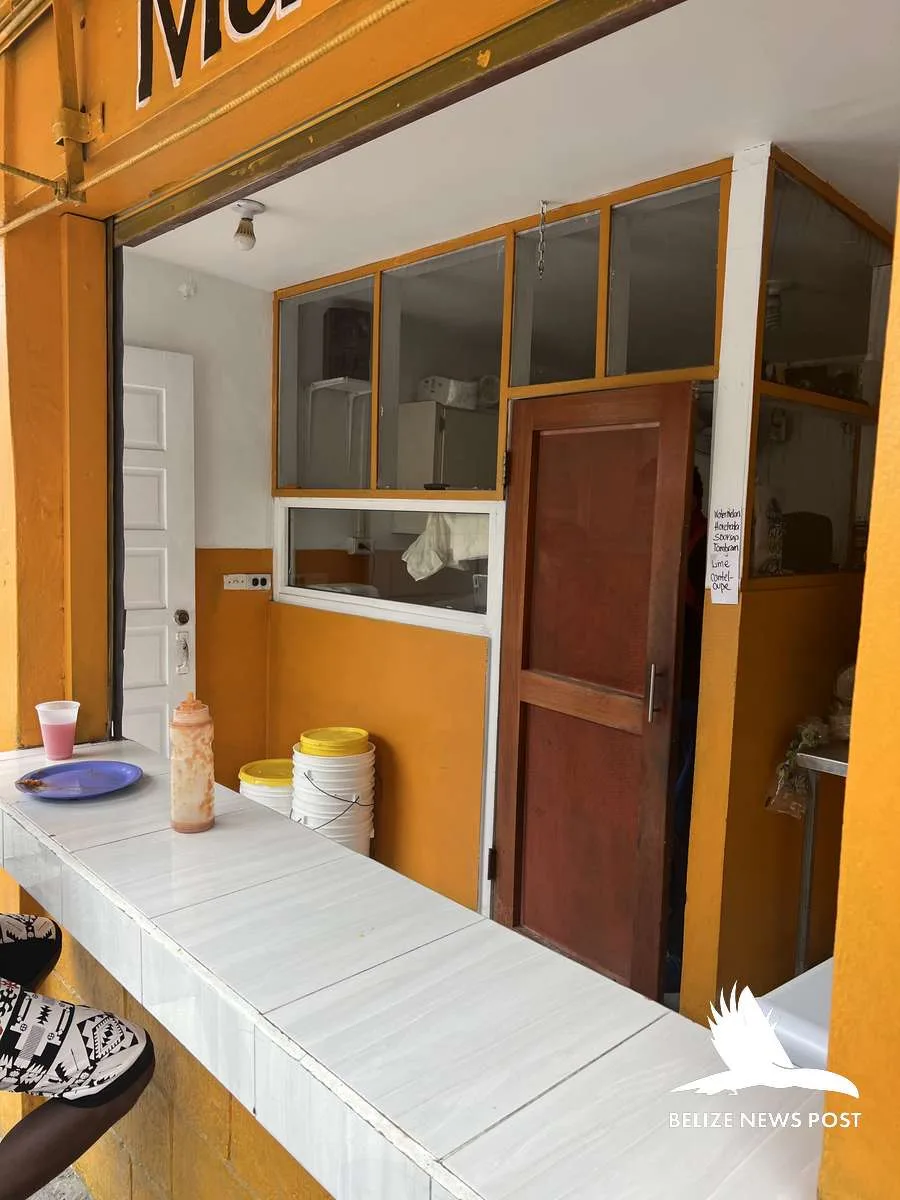 Belizean taqueria prep counter with serving area — orange walk tacos belize news post