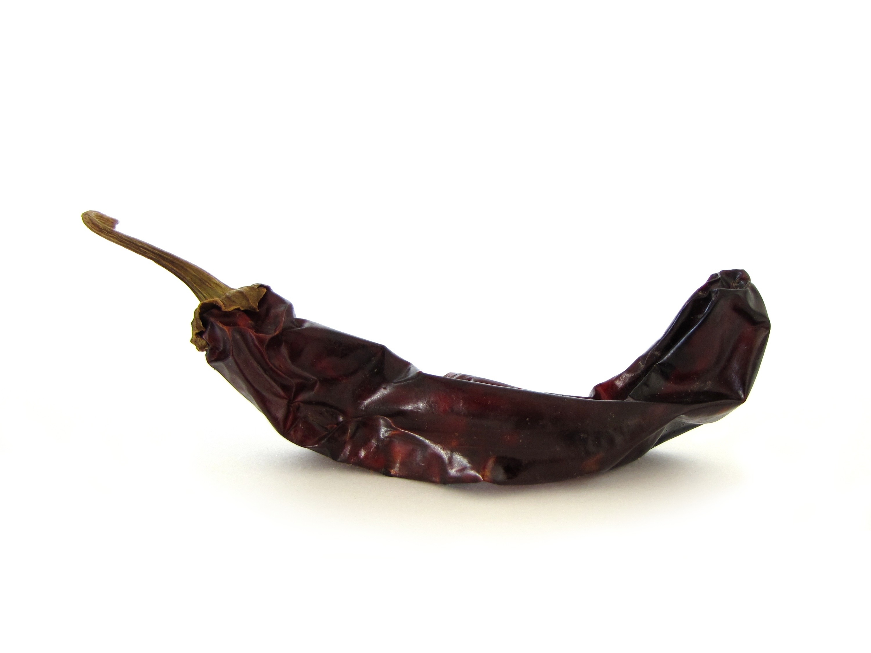 Dried guajillo chiles, a key ingredient in the Salvadoran relajo spice blend for pavo en relajo