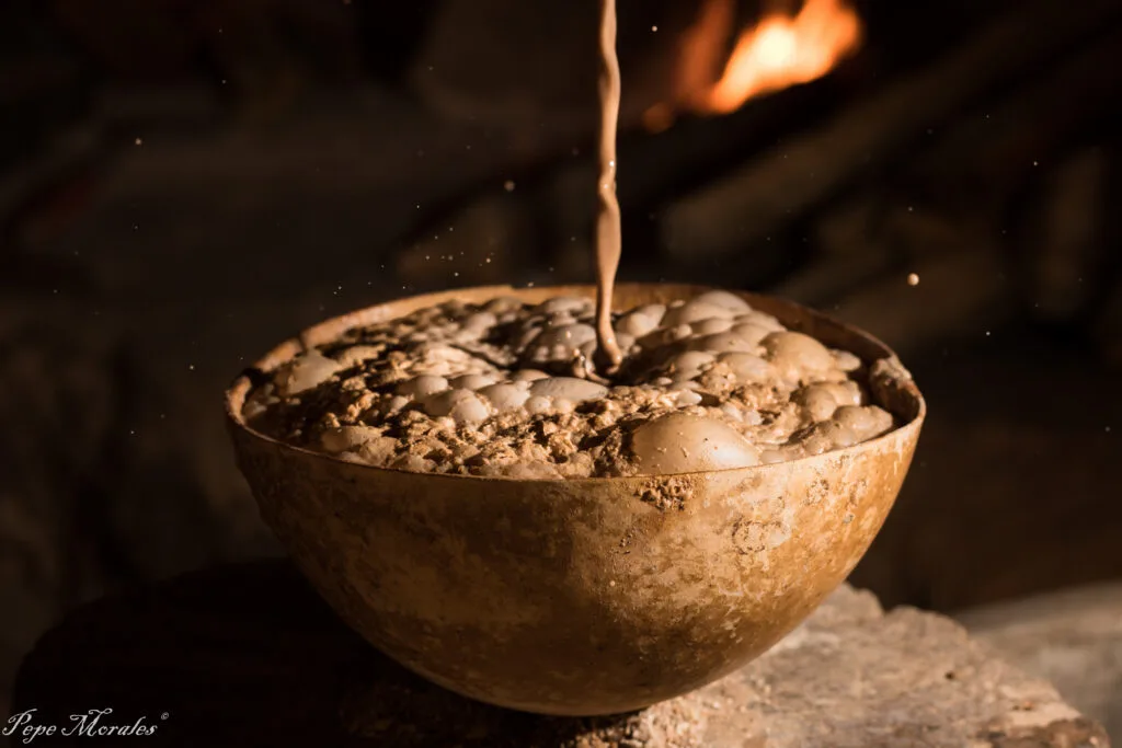 A cup of hot chilate, the traditional Salvadoran corn drink spiced with ginger and black pepper