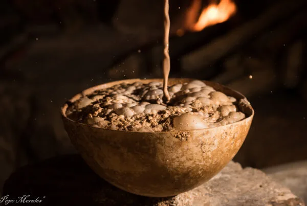 A cup of hot chilate, the traditional Salvadoran corn drink spiced with ginger and black pepper