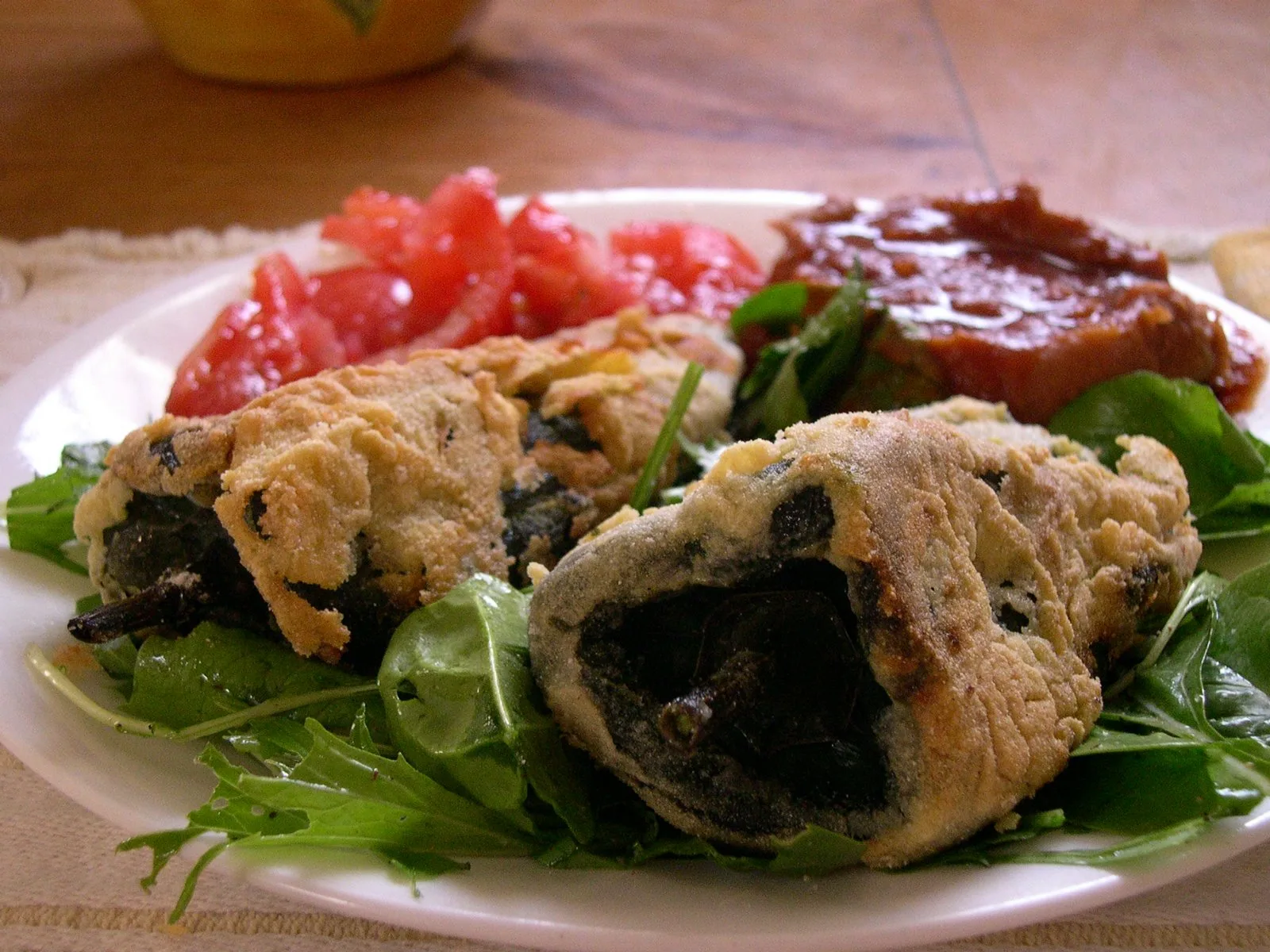 Plated Guatemalan chiles rellenos with white rice