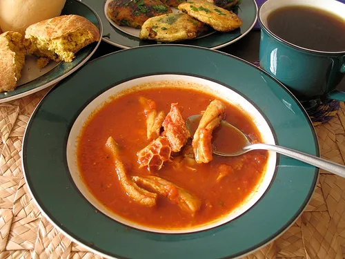 Guatemalan revolcado, a pork-head stew in thick red recado