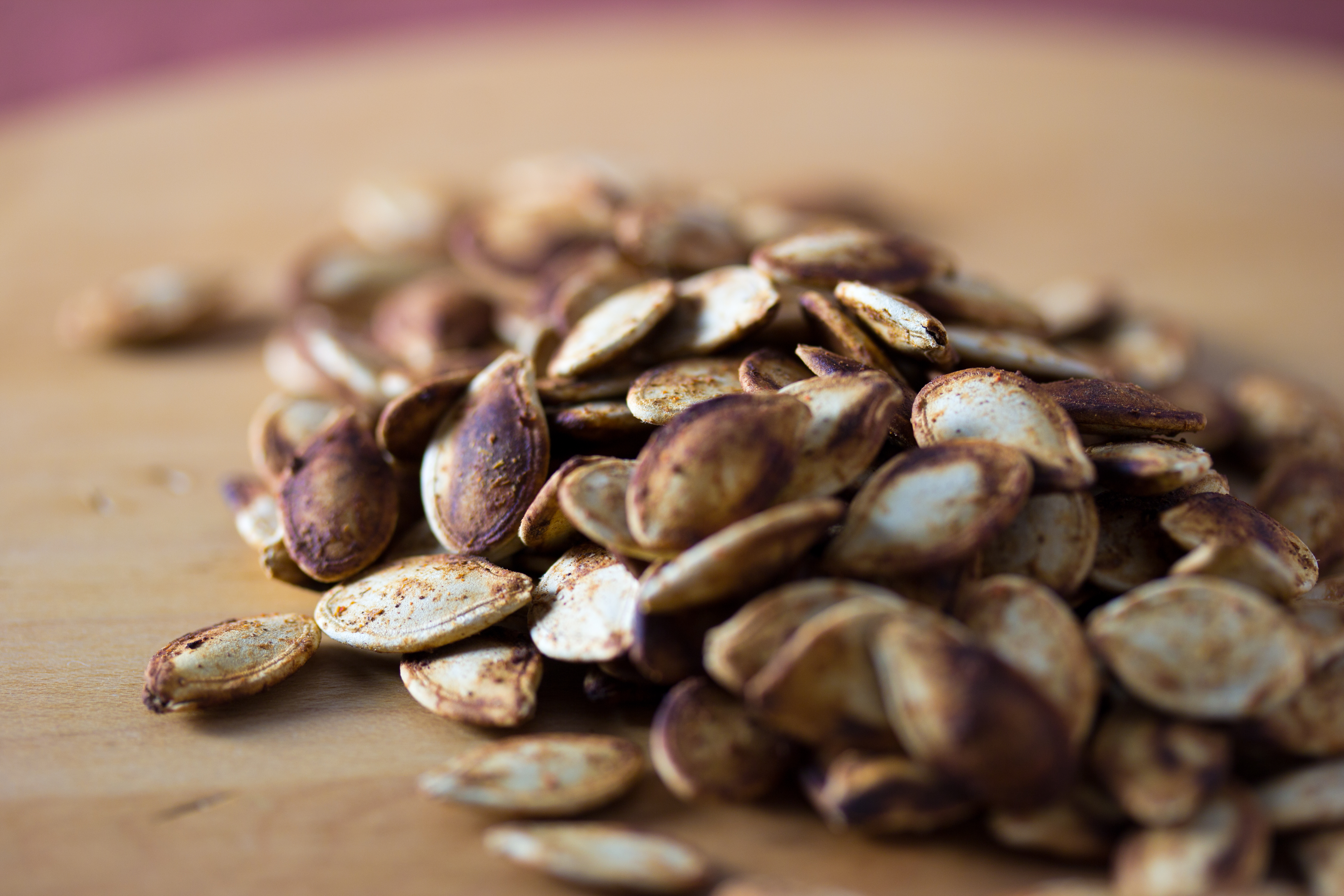 Bowl of roasted pumpkin seeds — toasted and ground, these become alguashte, the traditional Salvadoran pumpkin seed powder used on atol shuco