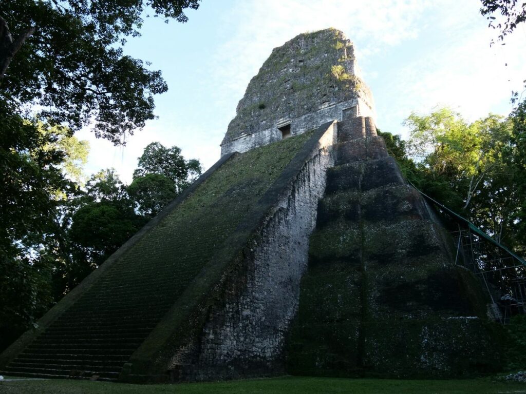 Tikal Maya temple pyramid rising above the Guatemalan jungle