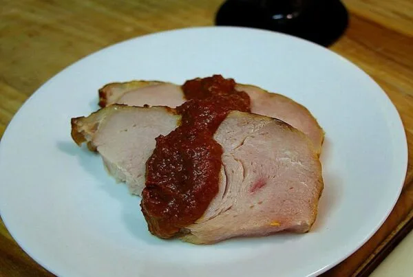 Sliced turkey napped with a dark seed-and-chile sauce, the braise-in-dark-sauce style of pavo en relajo