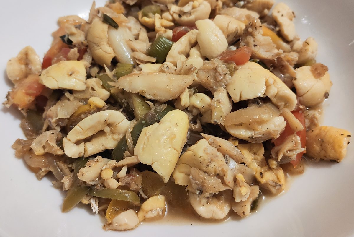 Jamaican ackee and saltfish served with fried dumplings