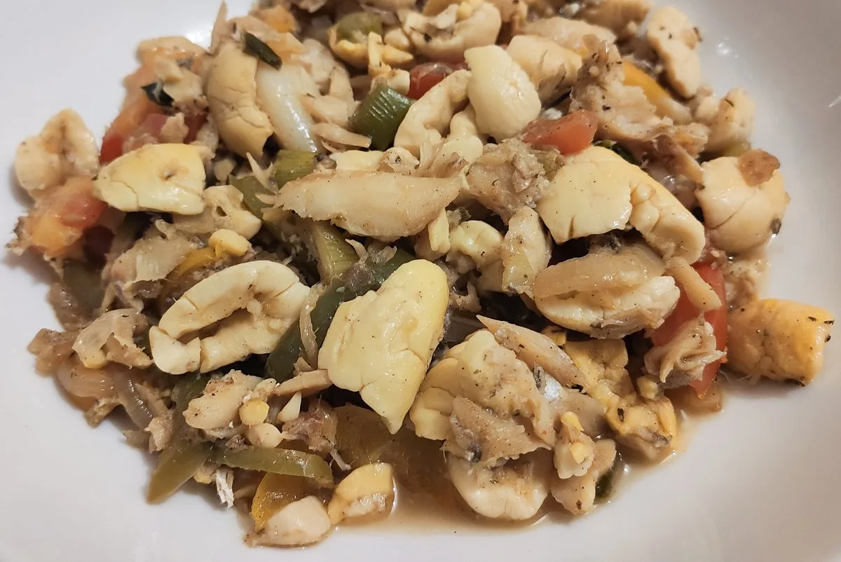 Jamaican ackee and saltfish served with fried dumplings