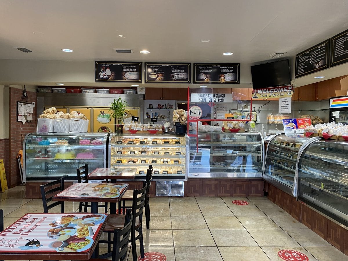 Interior of a Cuban bakery with display cases and pastry counters in Miami