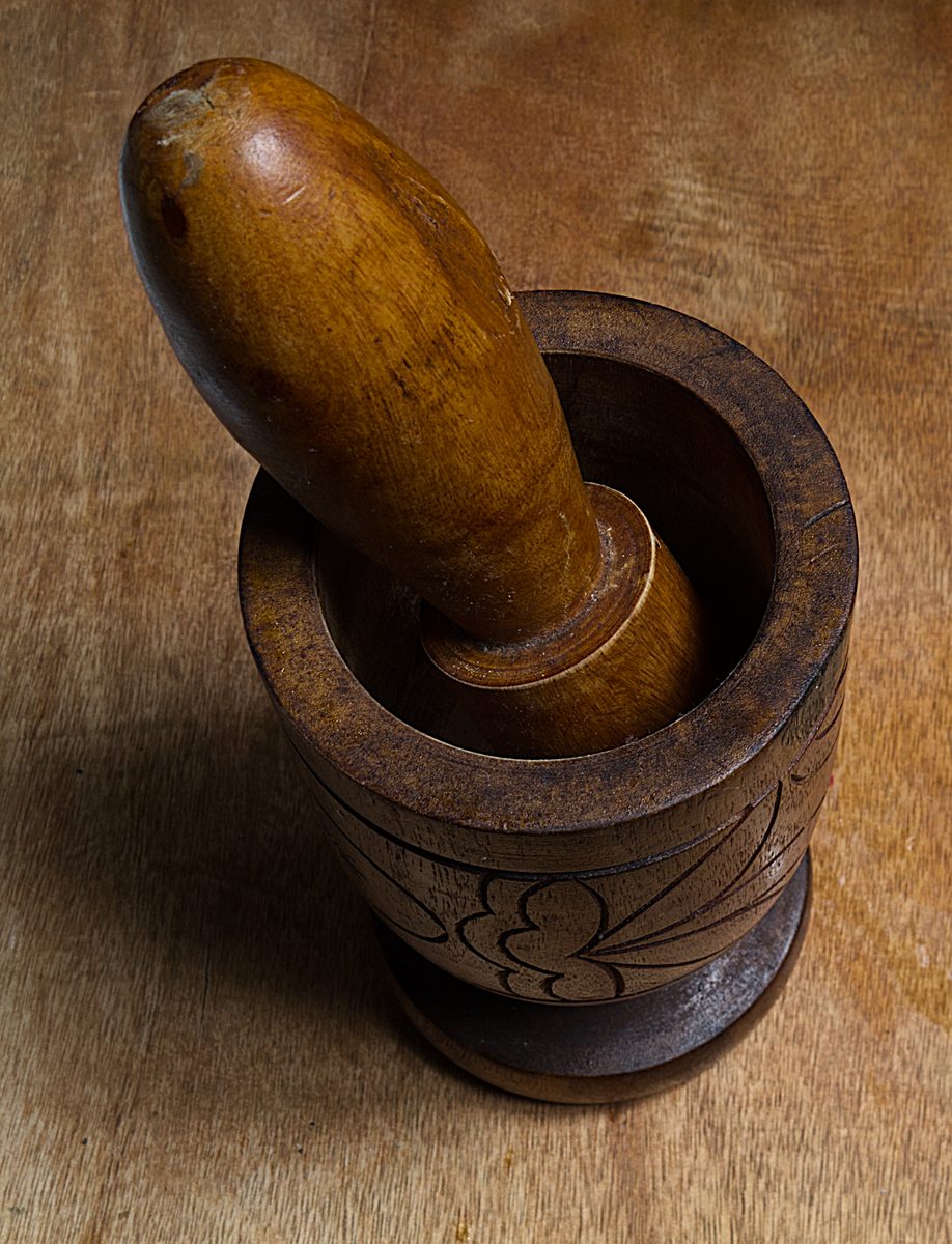 wooden pilon and pestle, the mortar used to mash mofongo