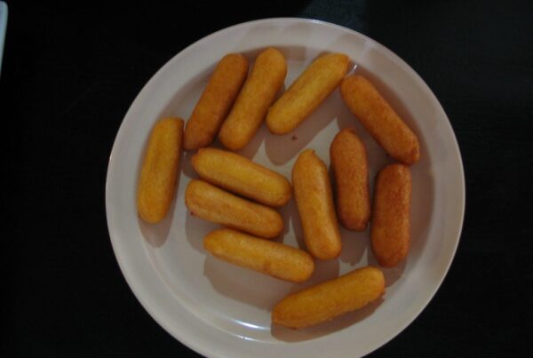 Plate of Puerto Rican sorullitos, fried cornmeal sticks