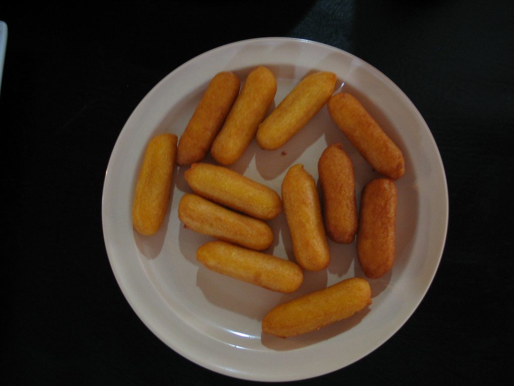 Plate of Puerto Rican sorullitos, fried cornmeal sticks