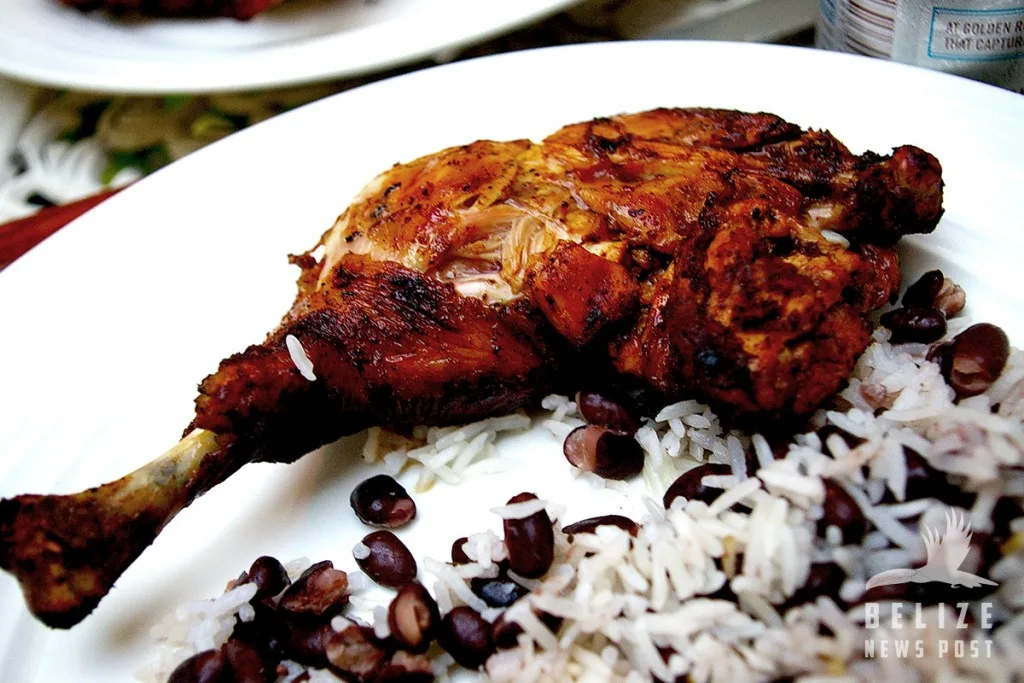 Belizean BBQ Chicken served with rice and beans