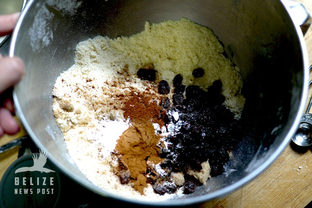 Dry ingredients in a mixing bowl, ready for wet ingredients of the Belizean Power Buns.