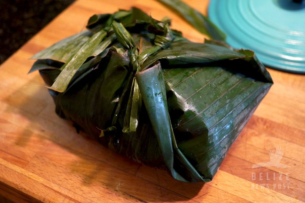 Cochinita Pibil recipe from Belize - Pork wrapped in banana leaves ready to cook.