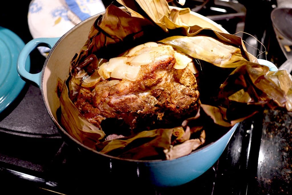 Cochinita Pibil recipe from Belize cooking in a Dutch Oven - ready to eat.