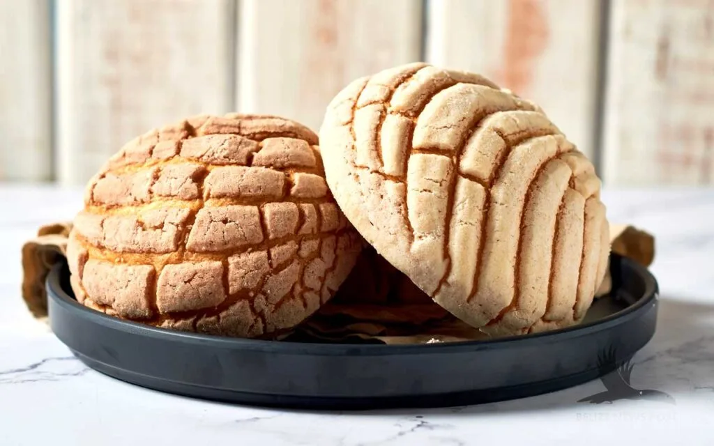 Two Caprichos or Pan Dulce Loaves on a plate - Recipe by Belize News Post