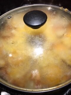 Cooking covered until cheese is melted