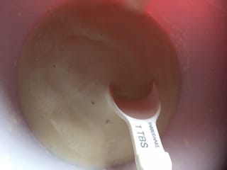 Activating the yeast in sugar water. 