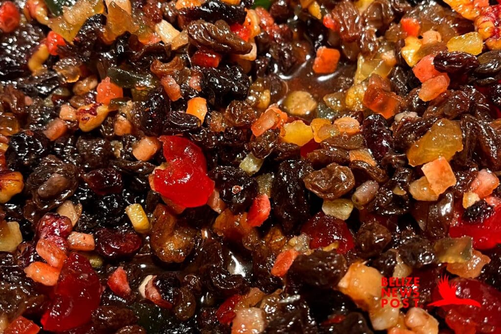 Stew candied fruits in Belizean Rum. Step in Fruit Cake Recipe.