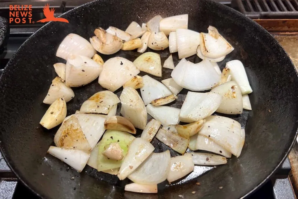 Browning onions for Belizean Beef Soup