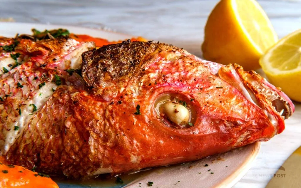 Belizean Stuffed Red Snapper Recipe - Red Snapper on Plate with Lemons