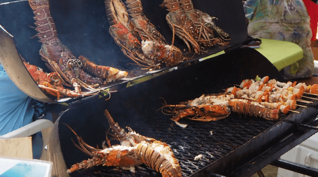 Lobesters Grilling in Belize - Belize Seafood 