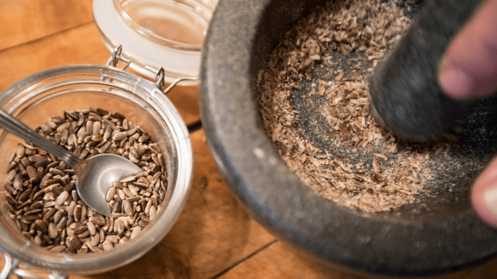 Grinding Seeds in Mortar and Pestle
