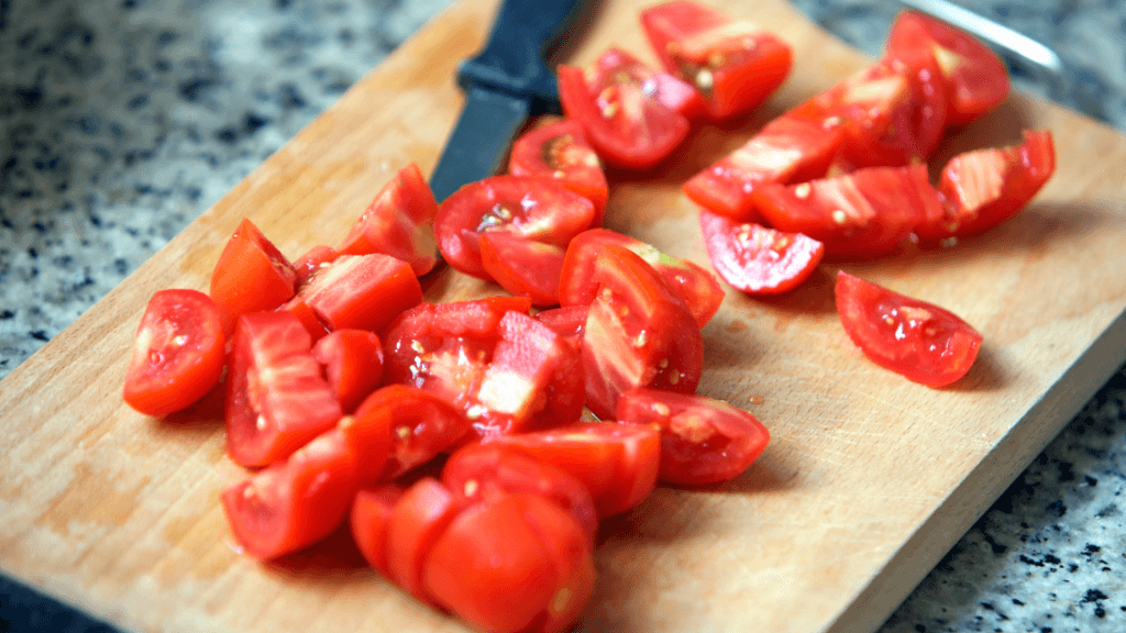 Chopped tomato for Pirishpak recipe - Eggs with tomato for Breakfast in Belize